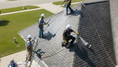 Roof cleaning service in Columbus, OH removing algae, moss, and debris from a residential roof